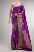 Pure Silk Purple Kanchipuram Saree with Zari Butta on the body and Zari Border.  displayed on a mannequin