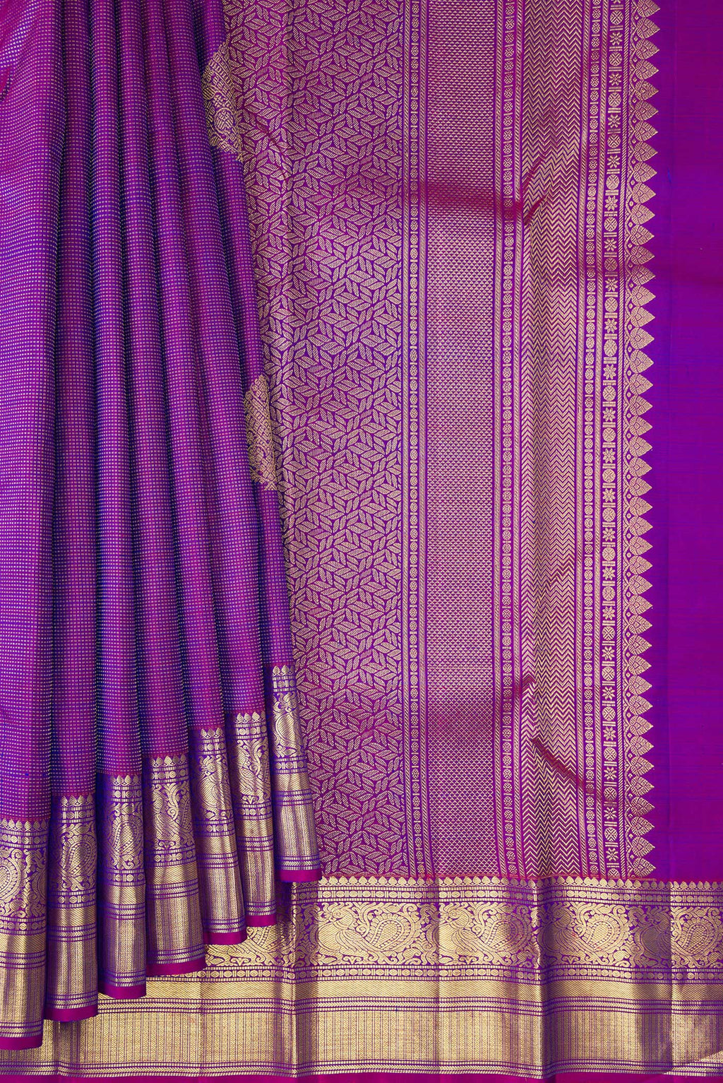 Pleats and pallu of Pure Silk Purple Kanchipuram Saree with Zari Butta on the body and Zari Border. 