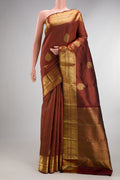 Pure Silk Maroon Kanchipuram Saree with Zari Butta on the body and Zari Border.  displayed on a mannequin