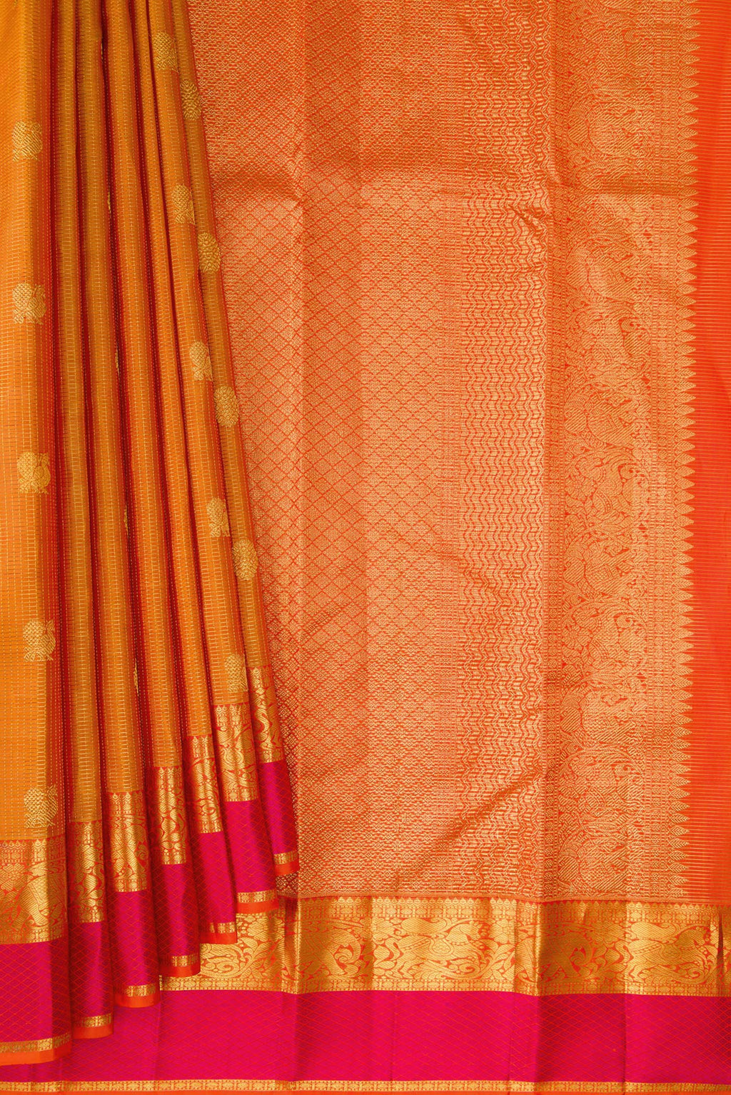 Pleats and pallu of Pure Silk Mustard Kanjivaram Saree with Checked design on the body and Zari And Thread Border. 