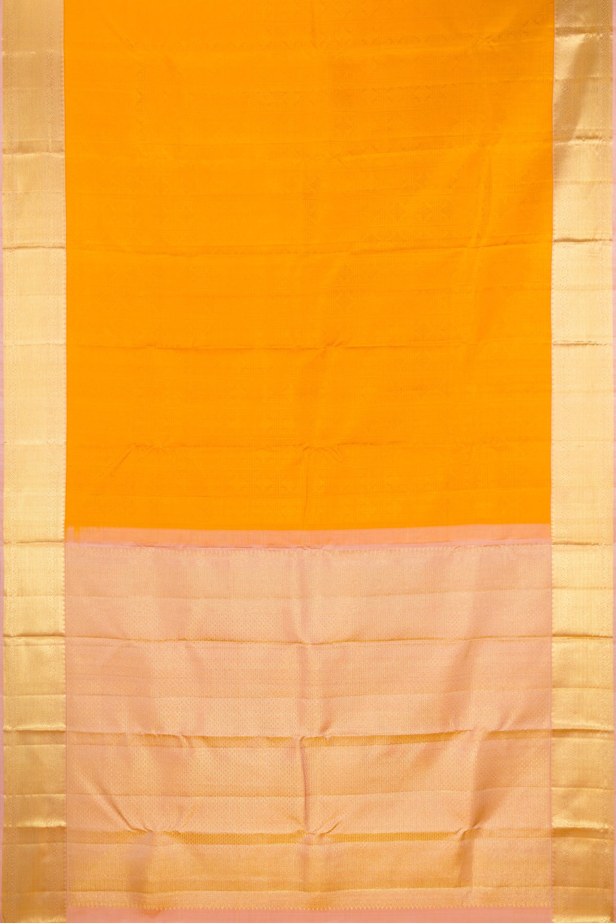 Flat view of Pure Silk Mustard Kanjivaram Saree with Jacquard design on the body and Zari Border. 