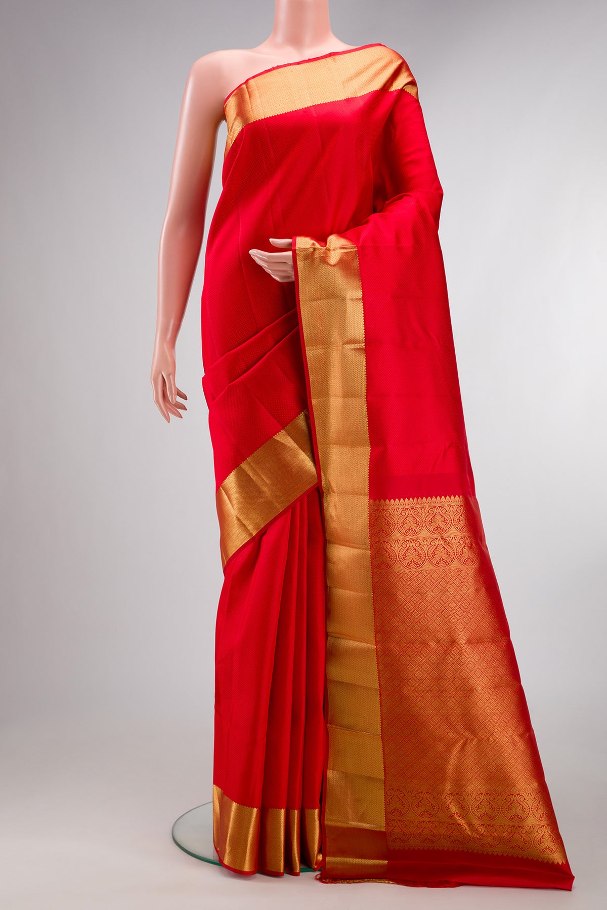 Pure Silk Red Dual Tone Kanjivaram Saree with Jacquard design on the body and Zari Border.  displayed on a mannequin