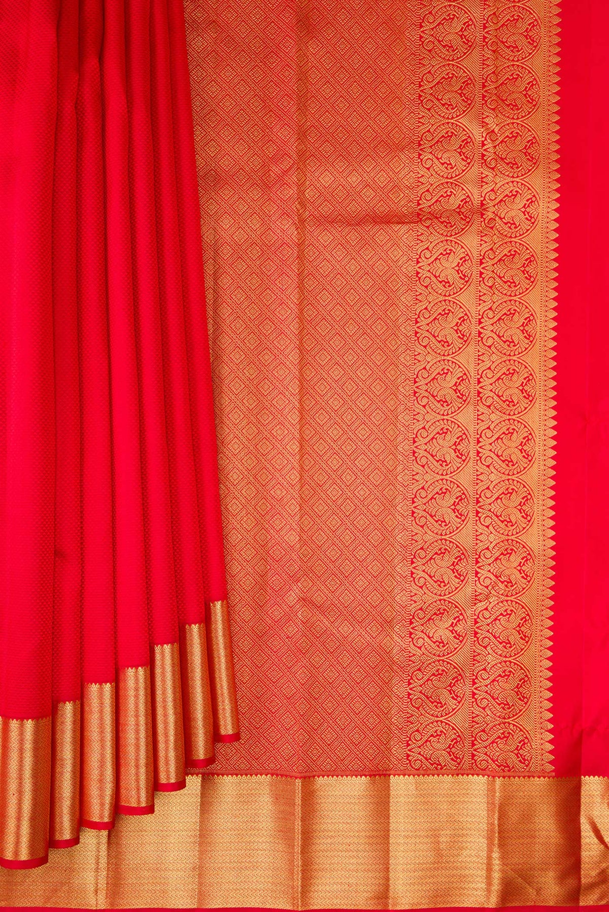Pleats and pallu of Pure Silk Red Dual Tone Kanjivaram Saree with Jacquard design on the body and Zari Border. 