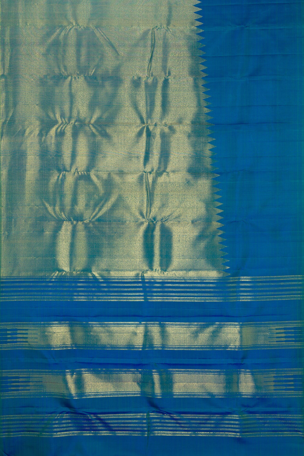 Flat view of Pure Silk Peacock Blue Dual Tone Kanjivaram Saree with Plain Body and Rising Temple Border. 