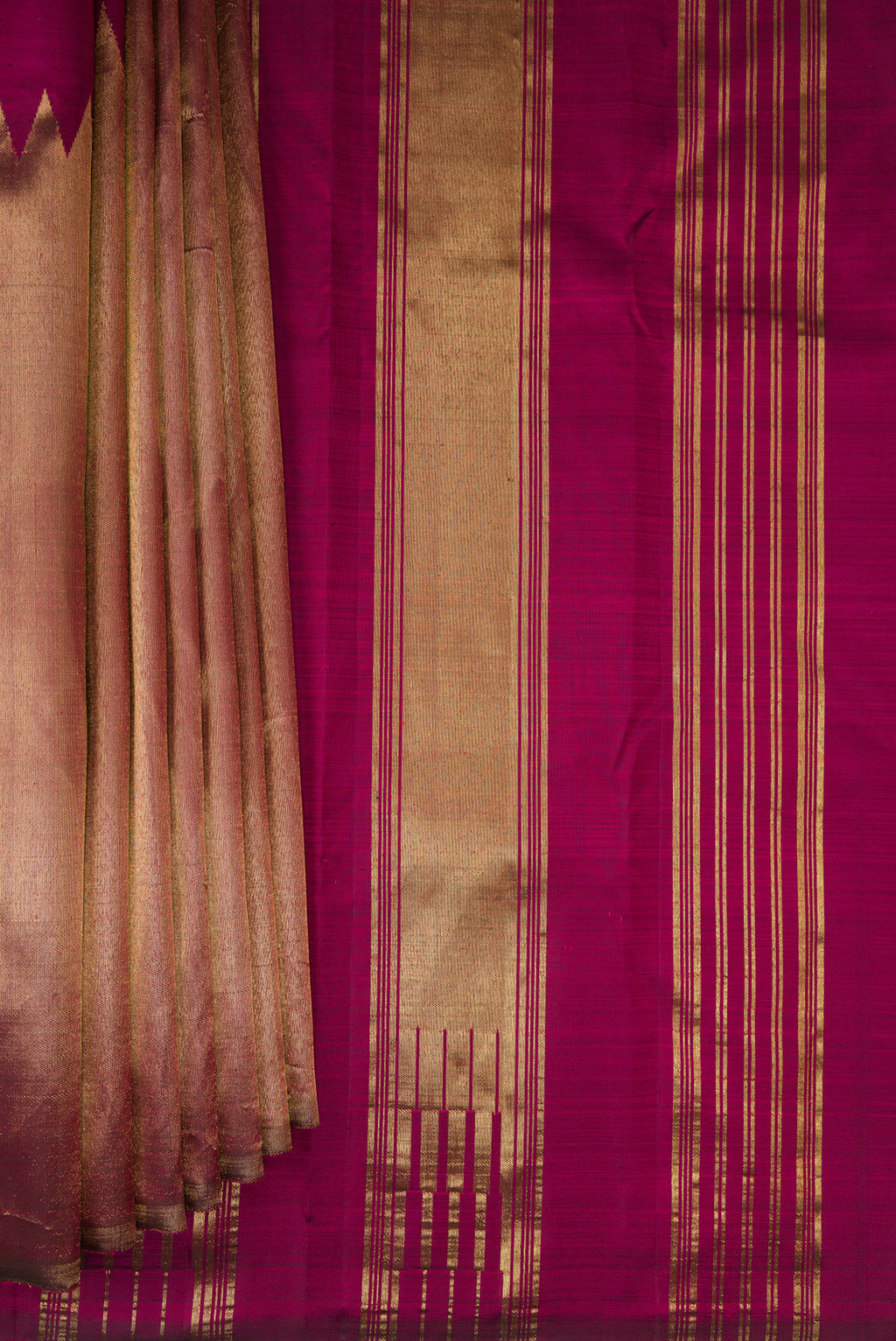 Pleats and pallu of Pure Silk Maroon Kanjivaram Saree with Plain Body and Rising Temple Border. 