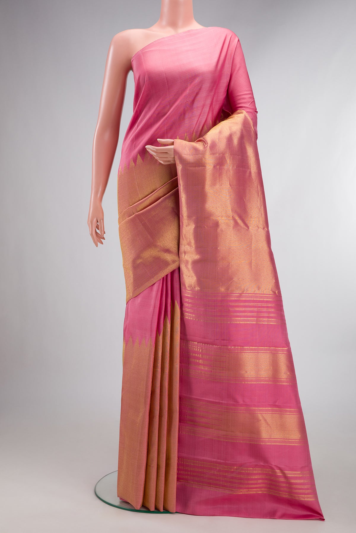 Pure Silk Pink Dual Tone Kanjivaram Saree with Plain Body and Rising Temple Border.  displayed on a mannequin