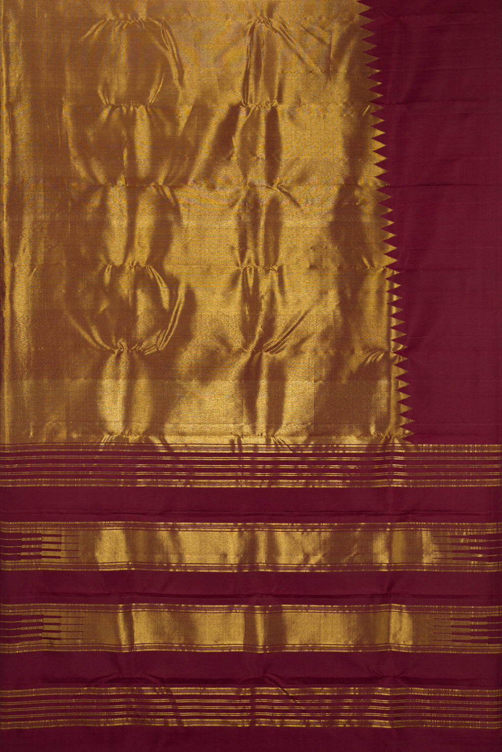 Flat view of Pure Silk Maroon Kanjivaram Saree with Plain Body and Rising Temple Border. 