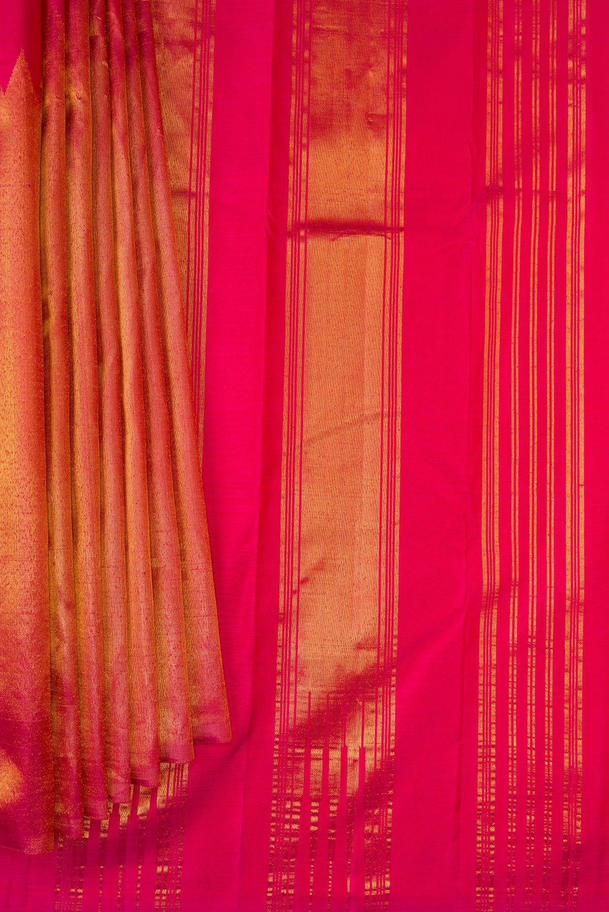 Pleats and pallu of Pure Silk Dark Pink Dual Tone Kanjivaram Saree with Plain Body and Rising Temple Border. 