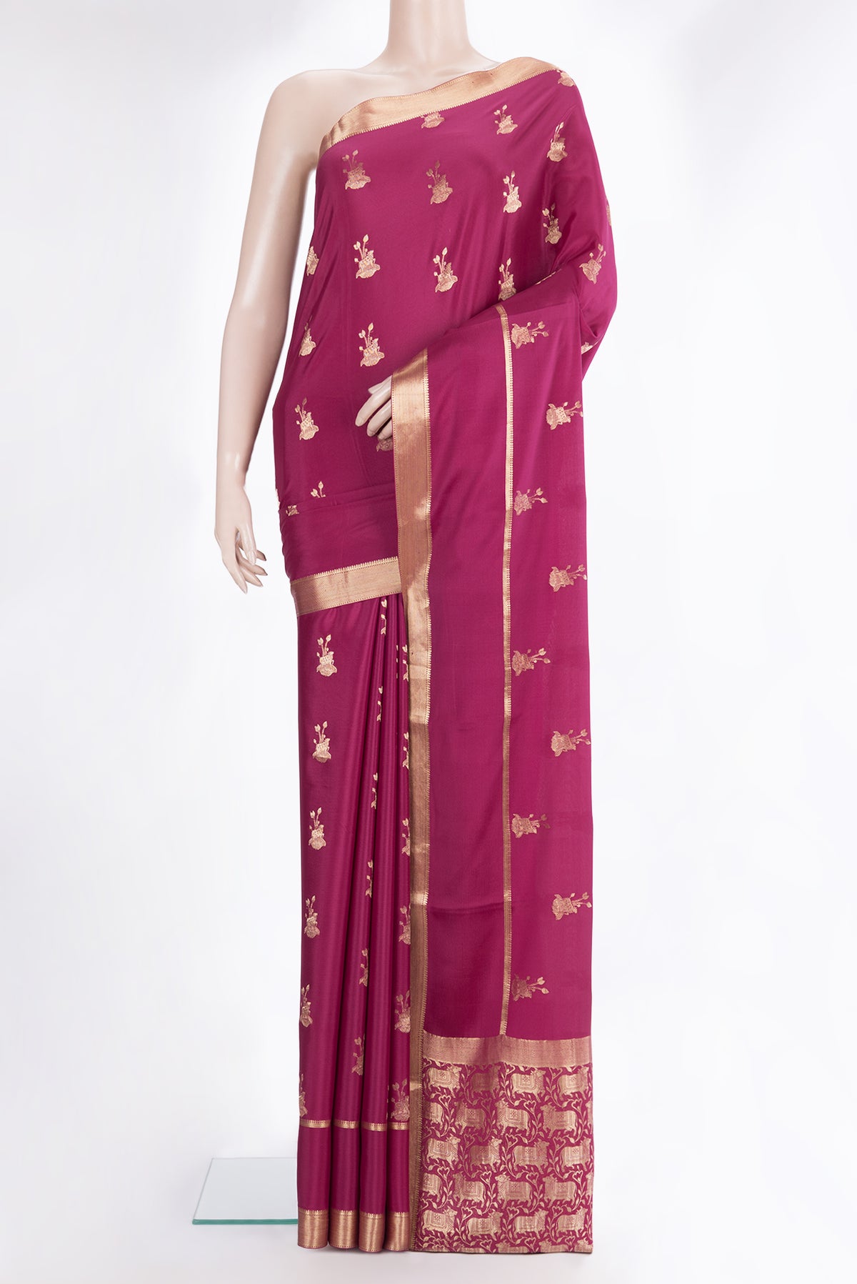 Magenta Dual Tone Banarasi Georgette Saree with Zari Butta on the body and Zari Border.  displayed on a mannequin