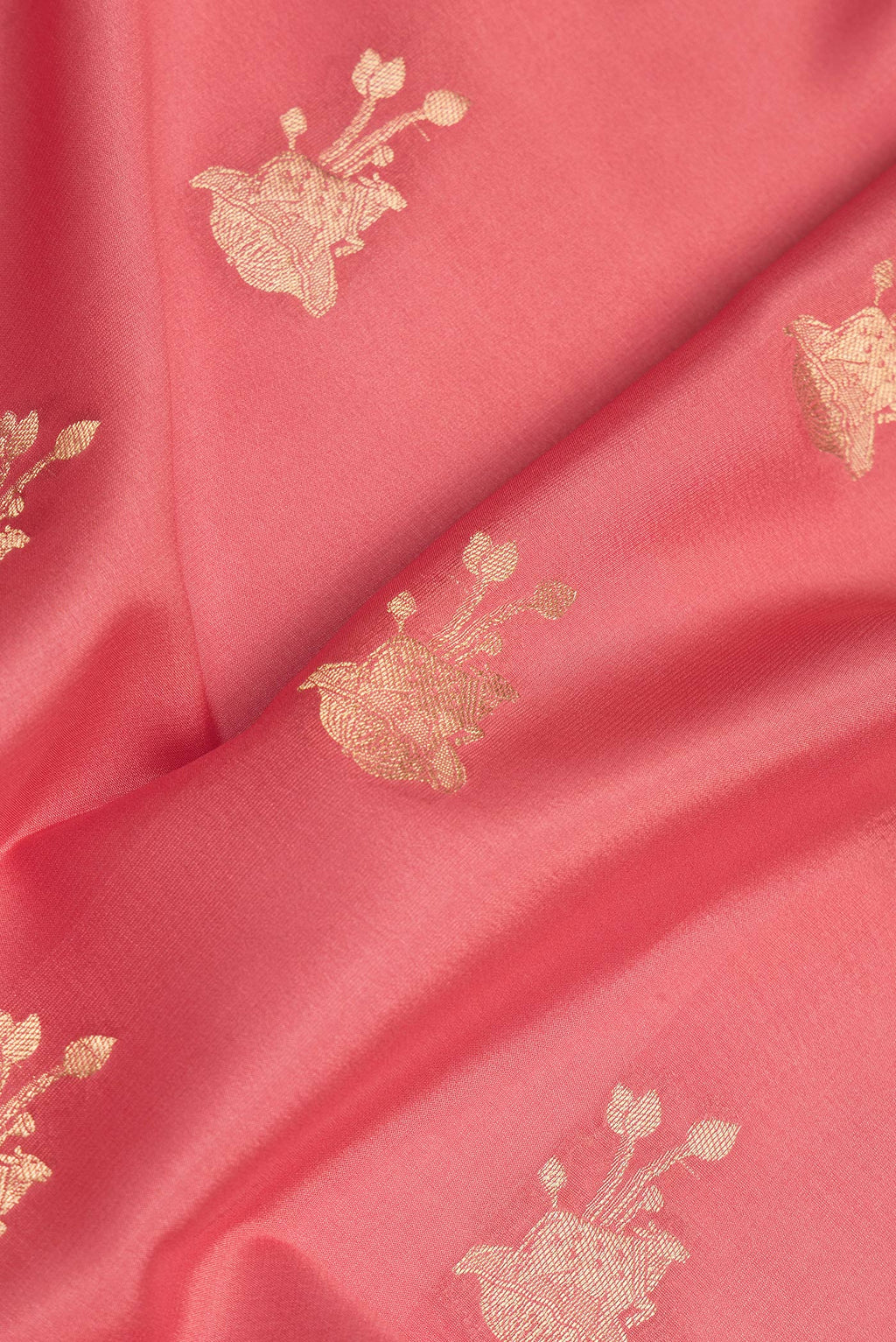 Close up of Pure Silk Pink Dual Tone Banarasi Georgette Saree with Zari Butta on the body and Zari Border.  displaying folds