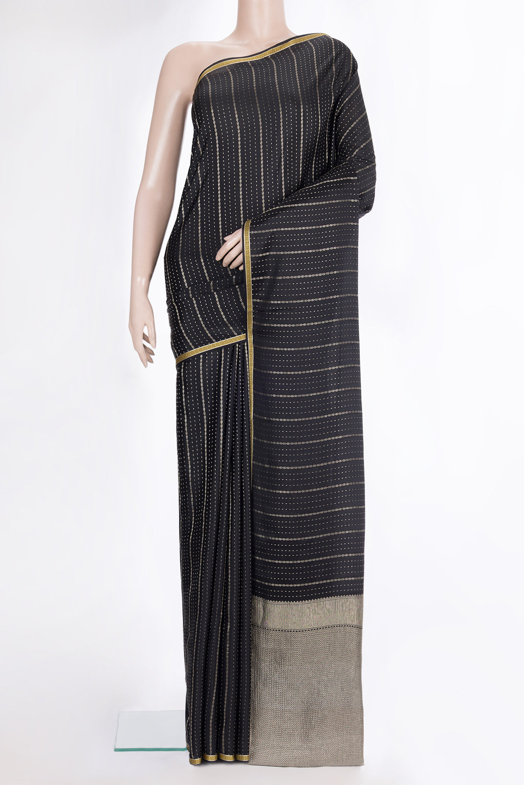 Pure Silk Black Dual Tone Banarasi Georgette Saree with Stripes on the body and Zari Border.  displayed on a mannequin