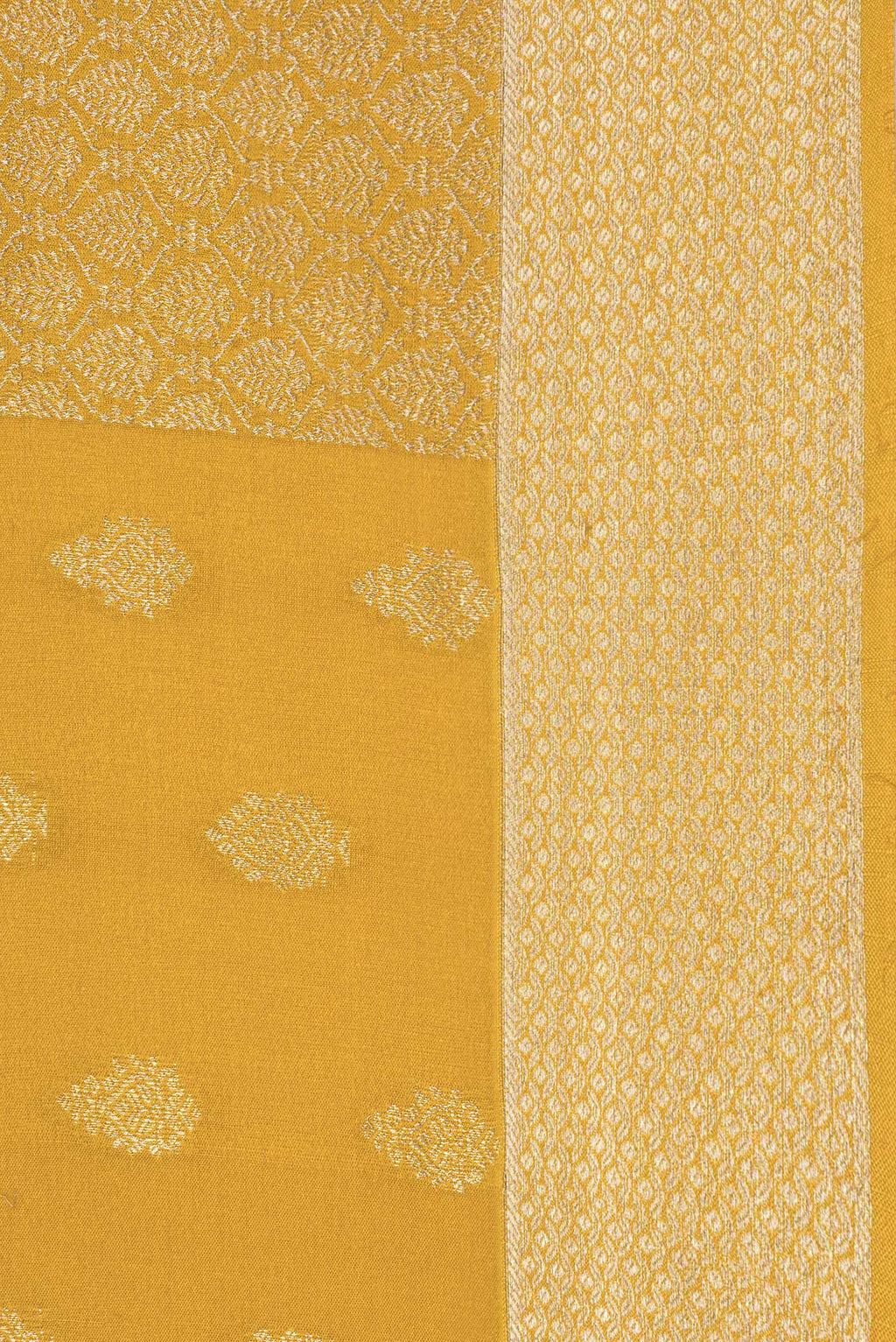 Border image of Pure Silk Mustard Dual Tone Banarasi Georgette Saree with Zari Butta on the body and Zari Border. 