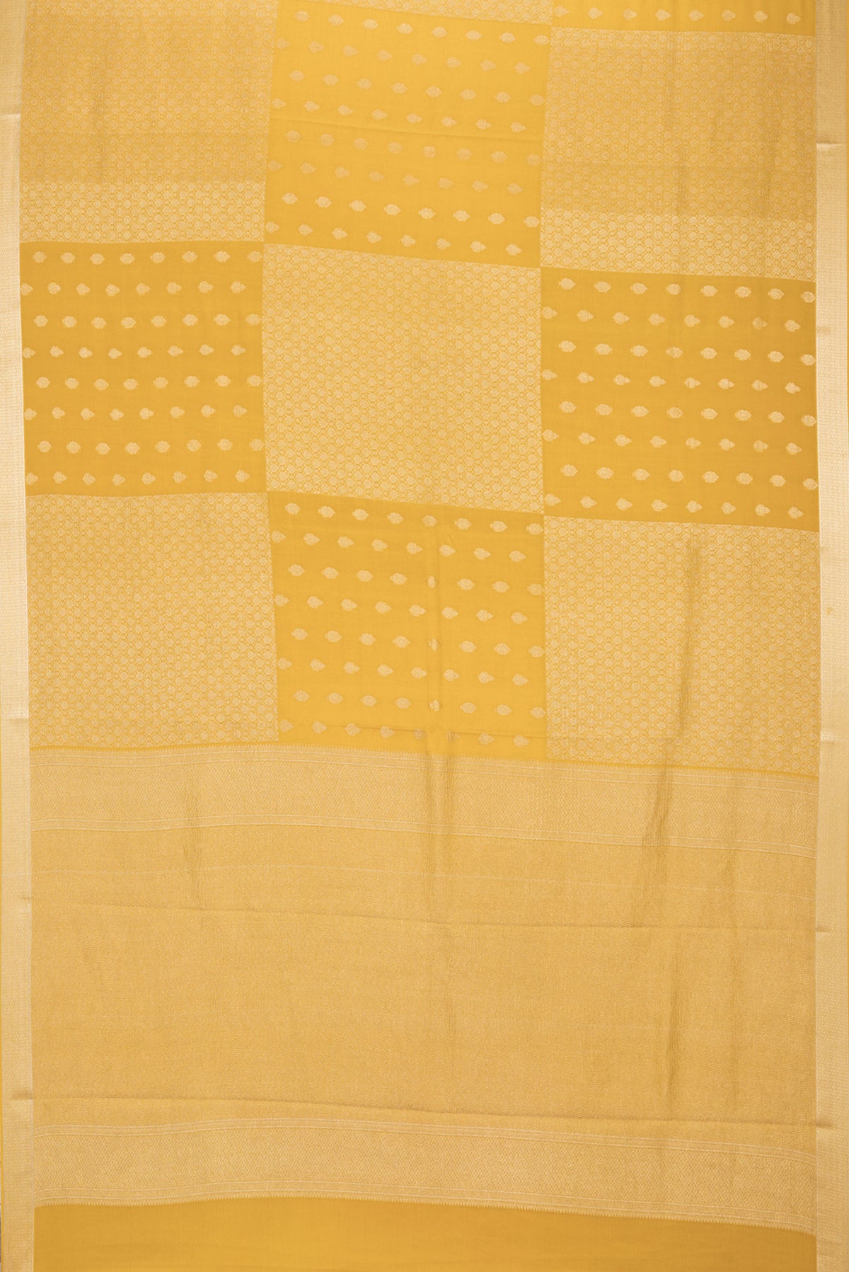 Flat view of Pure Silk Mustard Dual Tone Banarasi Georgette Saree with Zari Butta on the body and Zari Border. 