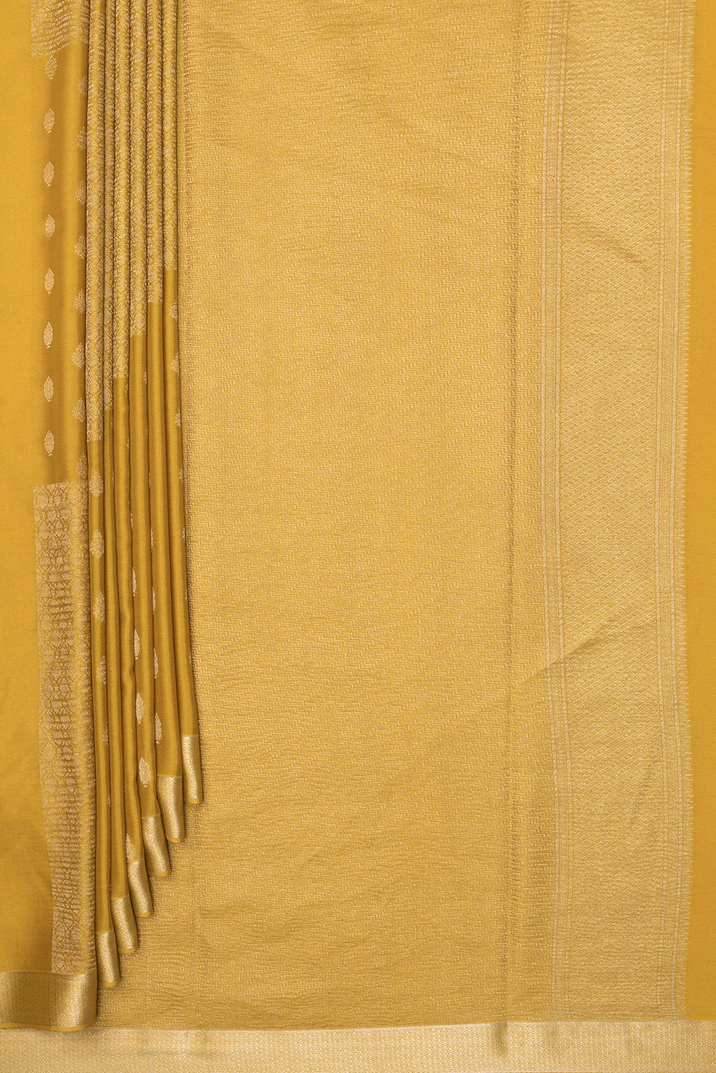 Pleats and pallu of Pure Silk Mustard Dual Tone Banarasi Georgette Saree with Zari Butta on the body and Zari Border. 