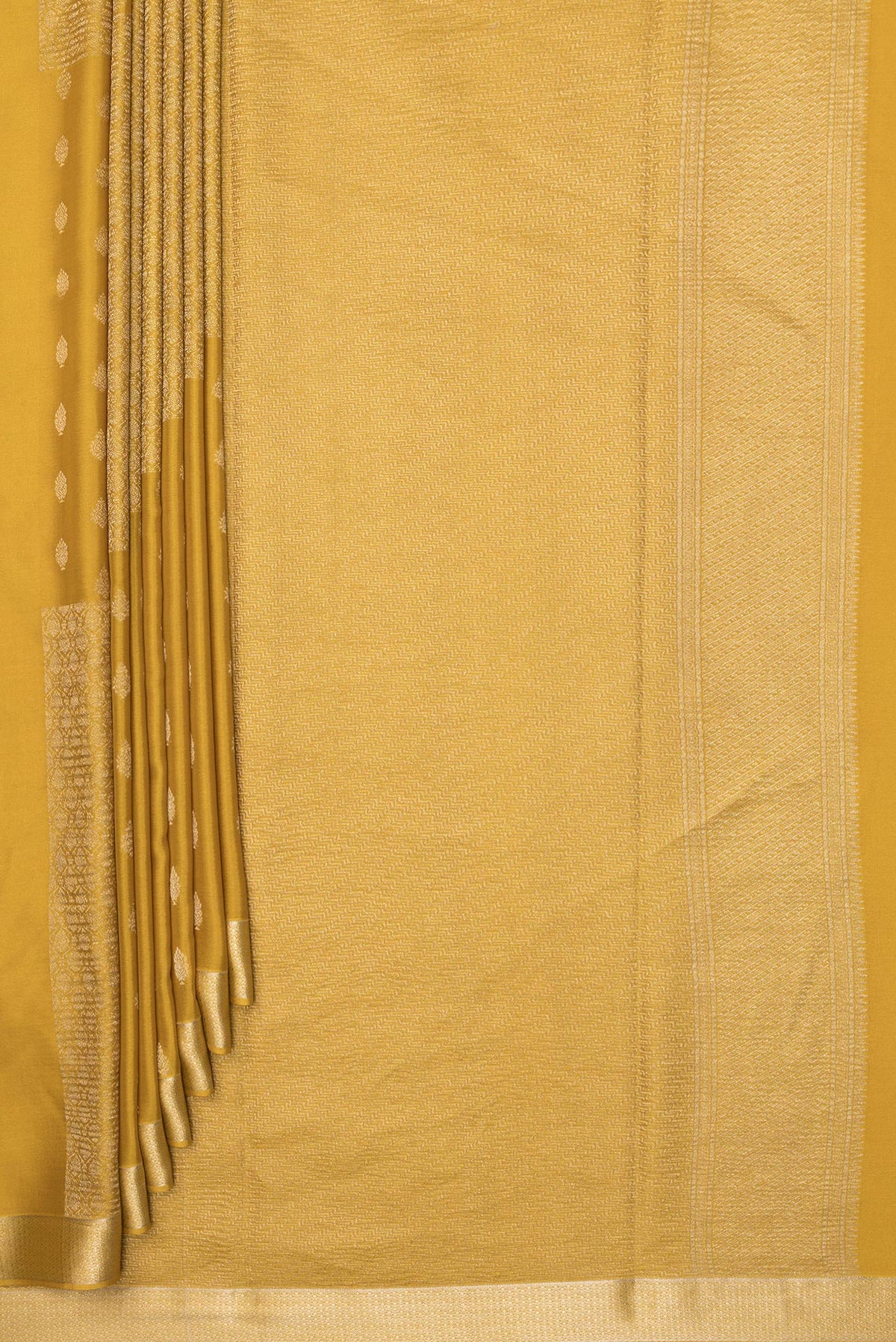 Pleats and pallu of Pure Silk Mustard Dual Tone Banarasi Georgette Saree with Zari Butta on the body and Zari Border. 