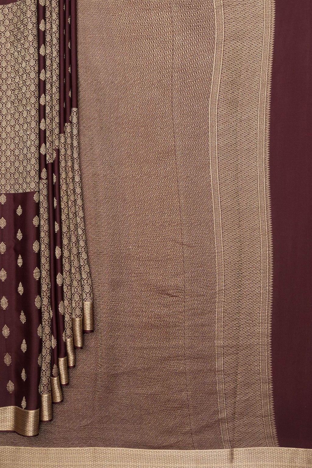 Pleats and pallu of Pure Silk Coffee Brown Dual Tone Banarasi Georgette Saree with Zari Butta on the body and Zari Border. 