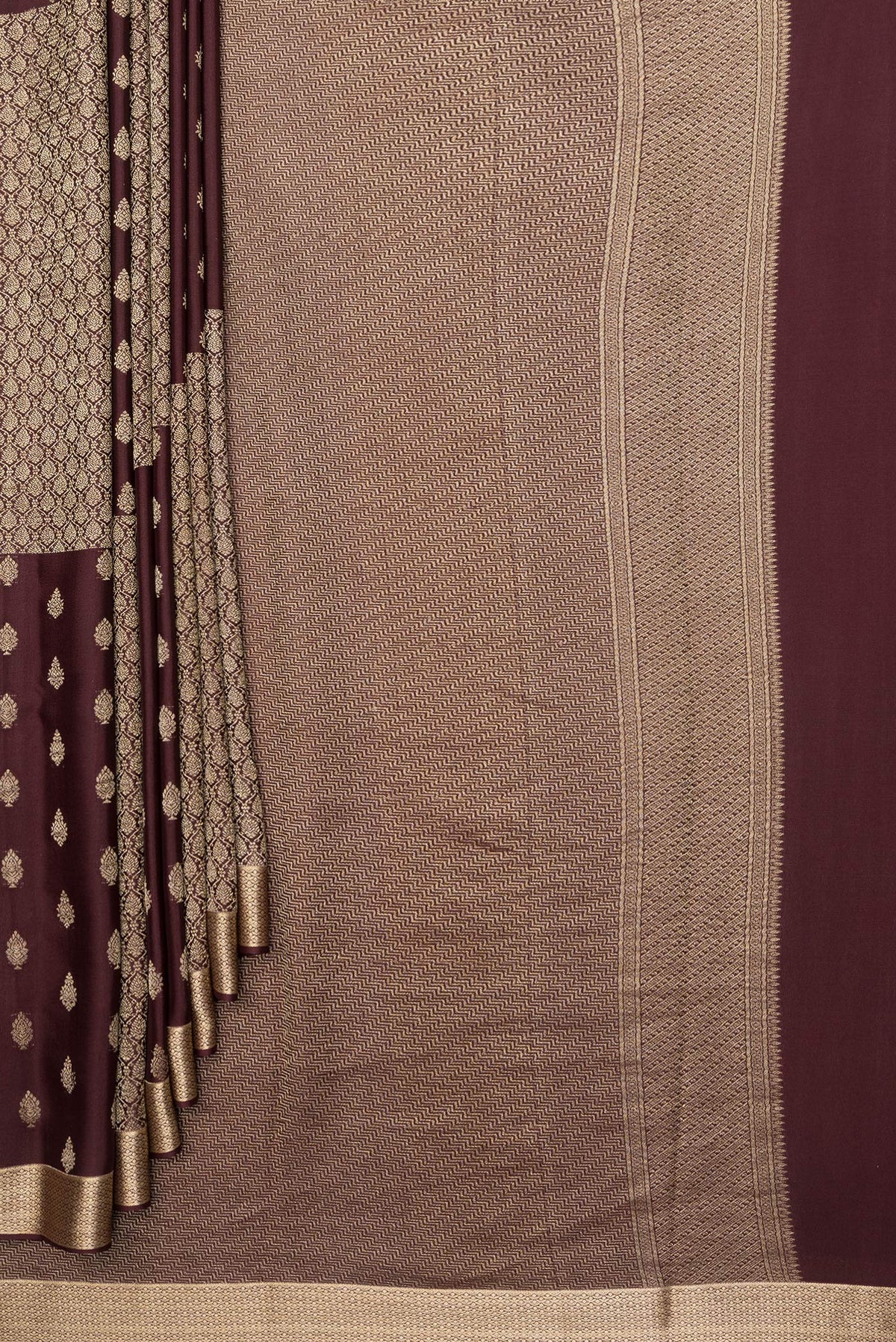 Pleats and pallu of Pure Silk Coffee Brown Dual Tone Banarasi Georgette Saree with Zari Butta on the body and Zari Border. 
