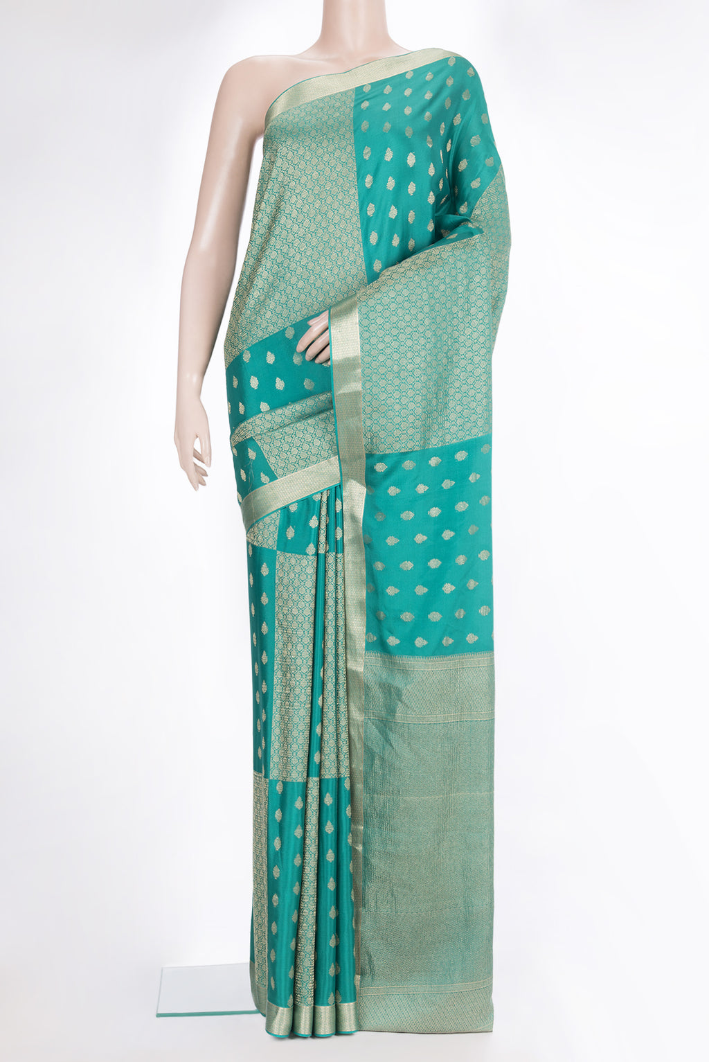 Pure Silk Sea Green Dual Tone Banarasi Georgette Saree with Zari Butta on the body and Zari Border.  displayed on a mannequin