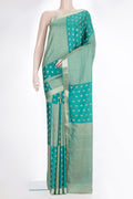 Pure Silk Sea Green Dual Tone Banarasi Georgette Saree with Zari Butta on the body and Zari Border.  displayed on a mannequin