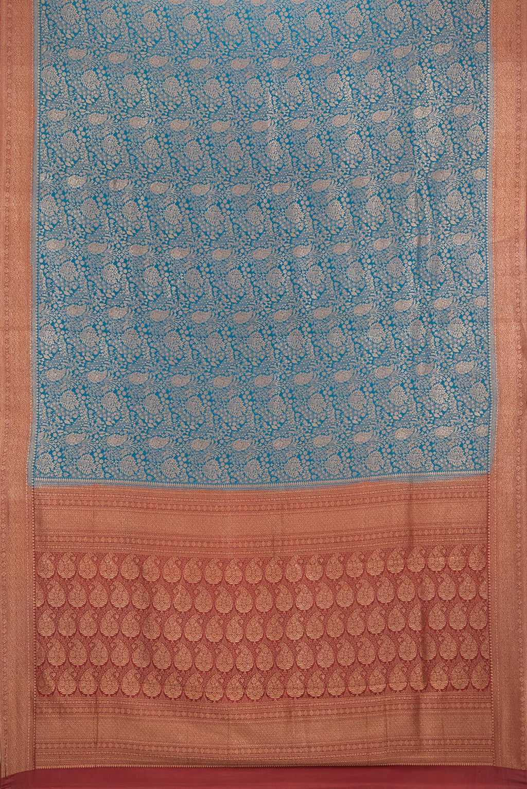 Flat view of Peacock Blue Dual Tone Banarasi Georgette Saree with Zari Brocade on the body and Zari Border. 