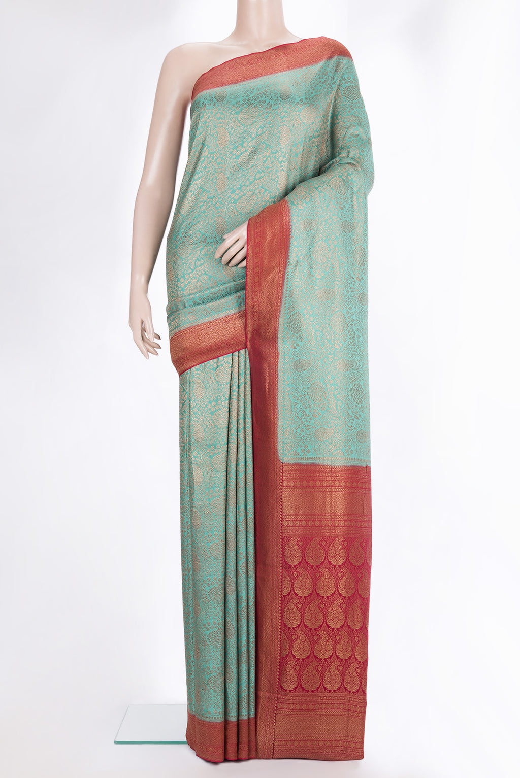 Sea Green Dual Tone Banarasi Georgette Saree with Zari Brocade on the body and Zari Border.  displayed on a mannequin