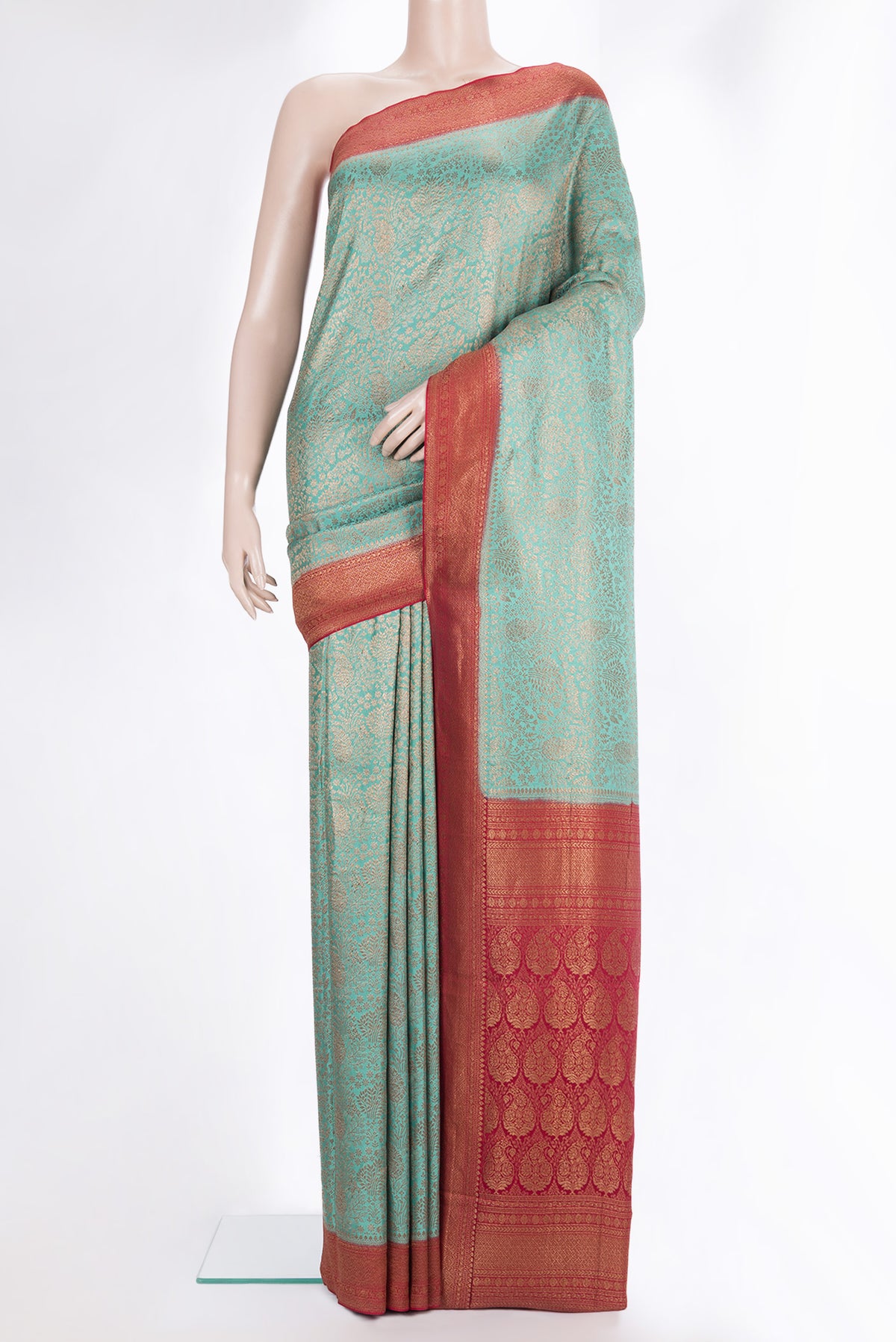 Sea Green Dual Tone Banarasi Georgette Saree with Zari Brocade on the body and Zari Border.  displayed on a mannequin