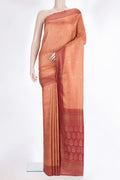 Peach Banarasi Georgette Saree with Zari Brocade on the body and Zari Border.  displayed on a mannequin