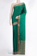 Green Dual Tone Banarasi Georgette Saree with Jacquard design on the body and Zari Border.  displayed on a mannequin