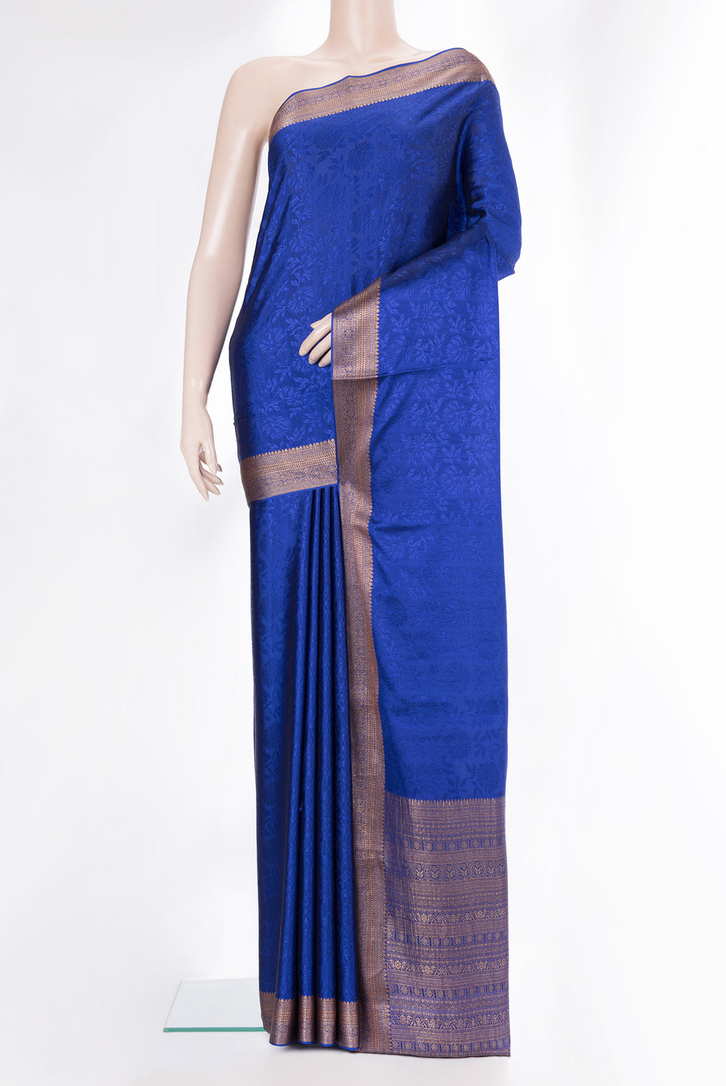 Royal Blue Mysore Crepe Saree with Jacquard design on the body and Zari Border.  displayed on a mannequin
