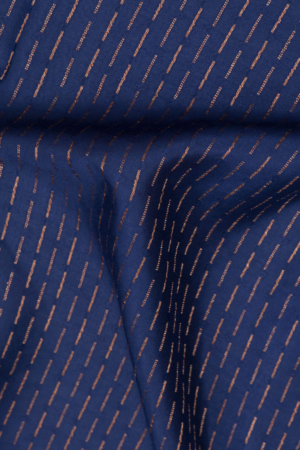 Close up of Navy Blue Dual Tone Banarasi Georgette Saree with Zari Butta on the body and Fancy Border.  displaying folds