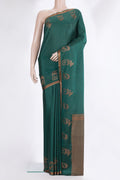 Bottle Green Dual Tone Banarasi Georgette Saree with Zari Brocade on the body and Fancy Border.  displayed on a mannequin