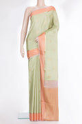 Pure Silk Pista Green Dual Tone Banarasi Georgette Saree with Zari Butta on the body and Zari Border.  displayed on a mannequin