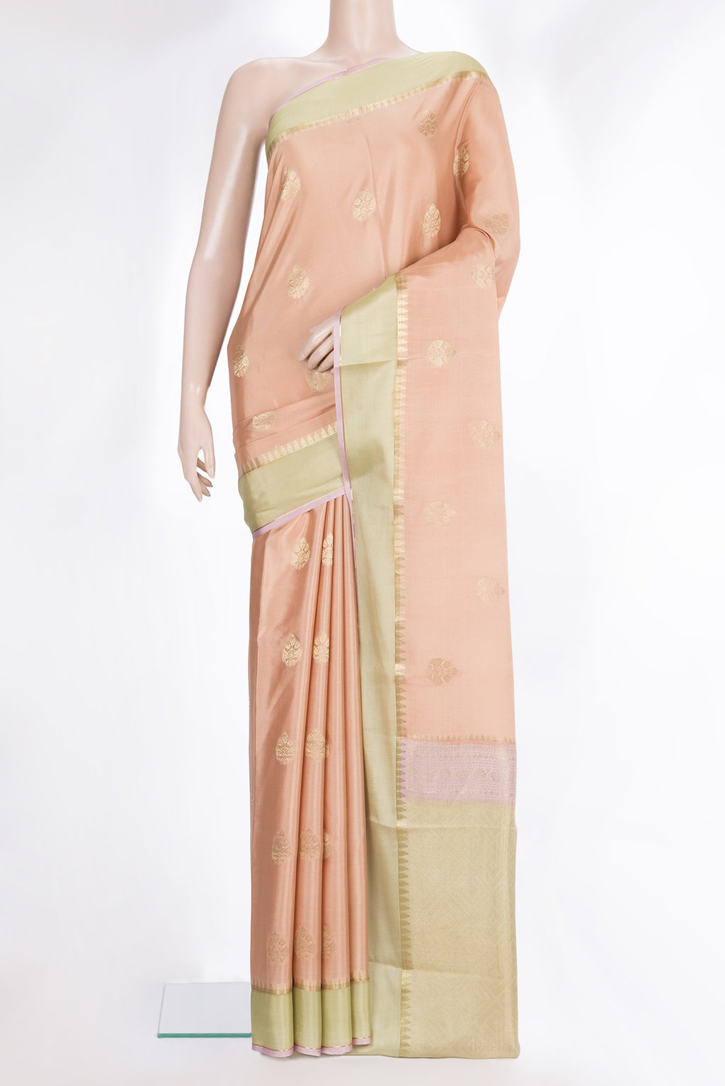 Pure Silk Golden Peach Dual Tone Banarasi Georgette Saree with Zari Butta on the body and Zari Border.  displayed on a mannequin