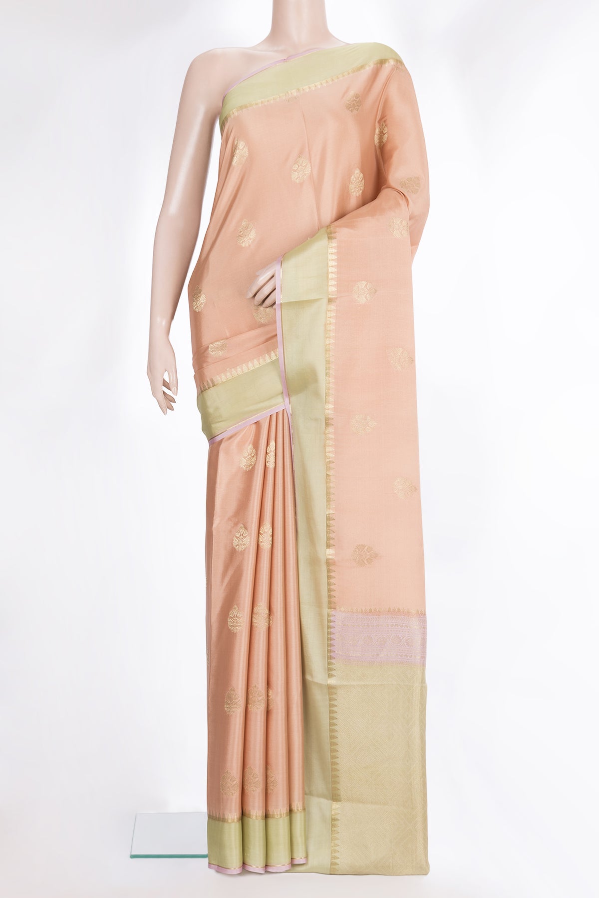 Pure Silk Golden Peach Dual Tone Banarasi Georgette Saree with Zari Butta on the body and Zari Border.  displayed on a mannequin