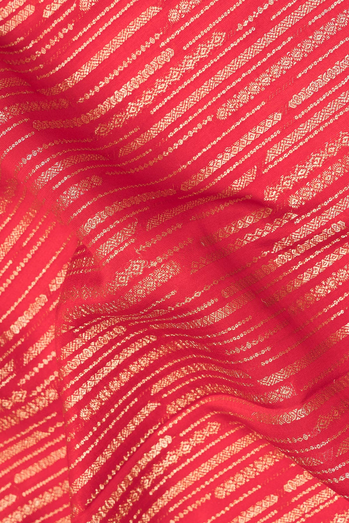 Close up of Red Dual Tone Banarasi Georgette Saree with Zari Brocade on the body and Zari Border.  displaying folds