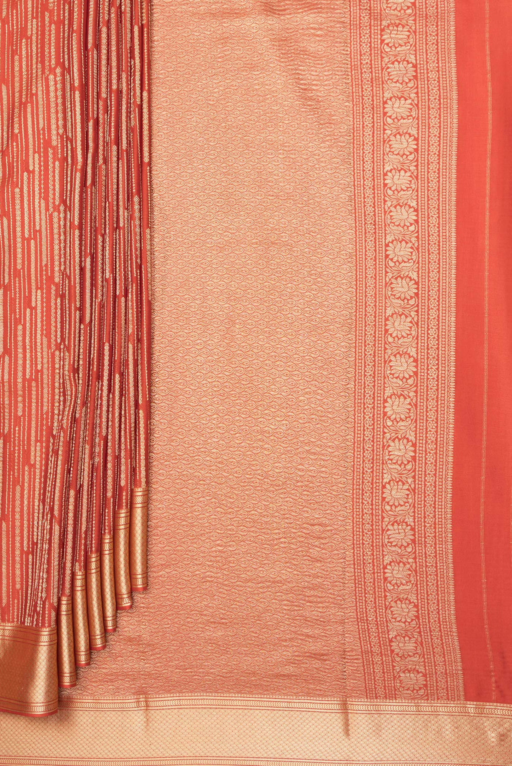 Pleats and pallu of Pure Silk Rust Dual Tone Banarasi Georgette Saree with Zari Brocade on the body and Zari Border. 