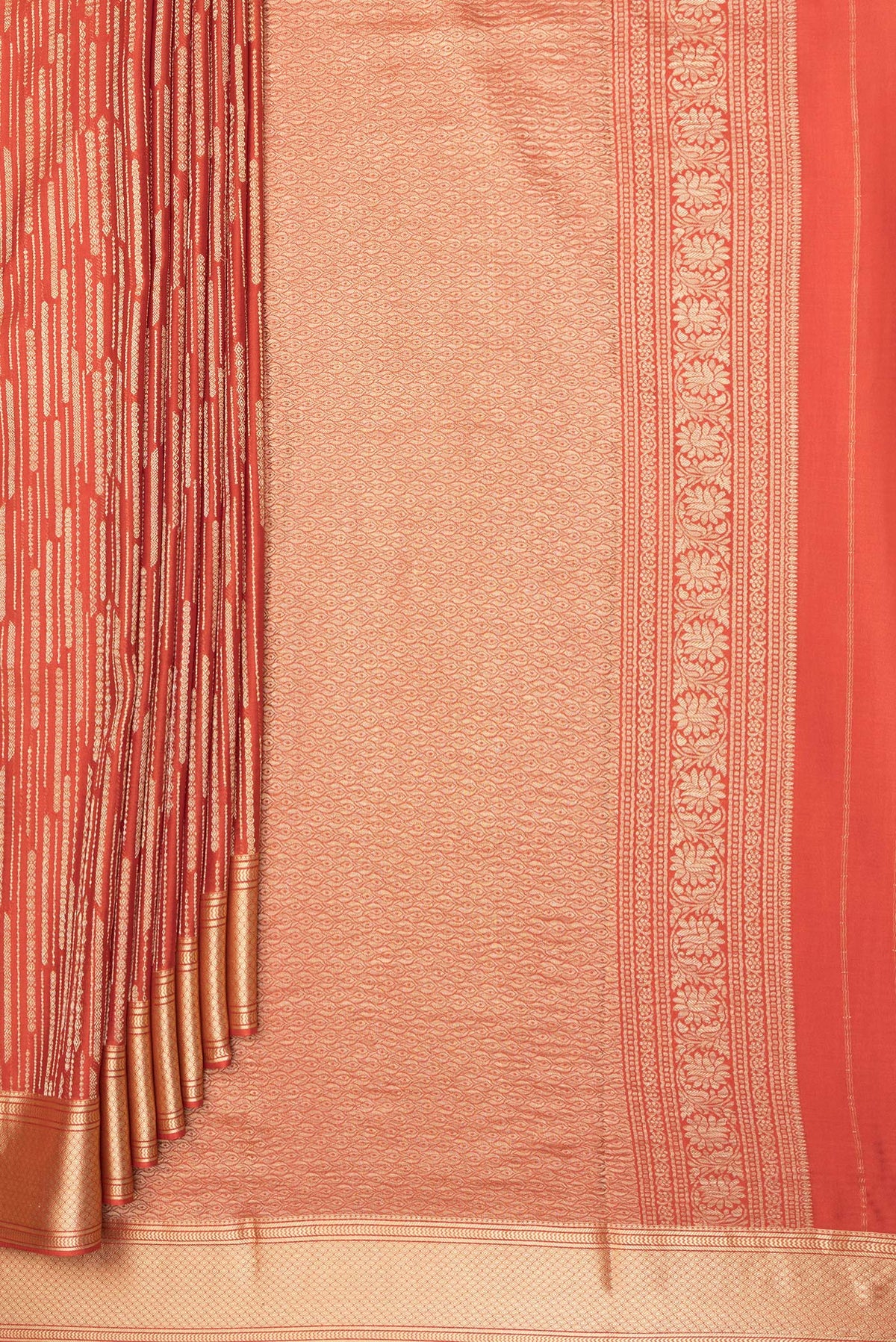 Pleats and pallu of Pure Silk Rust Dual Tone Banarasi Georgette Saree with Zari Brocade on the body and Zari Border. 