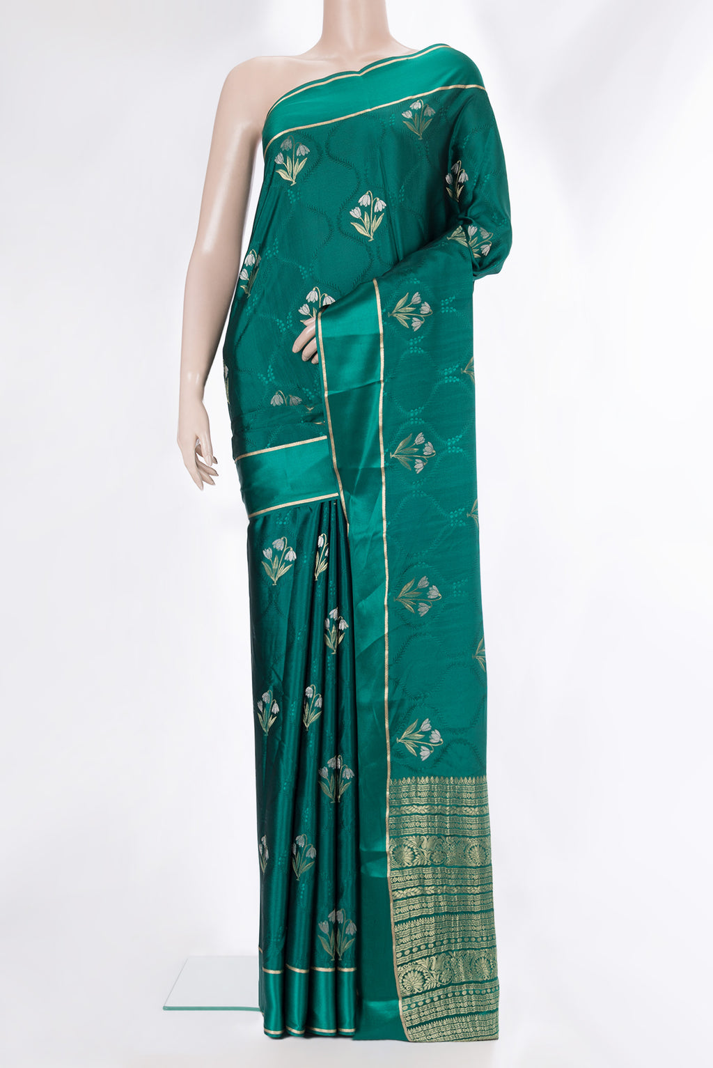 Green Mysore Crepe Saree with Jacquard With Zari Butta on the body and Zari Border.  displayed on a mannequin