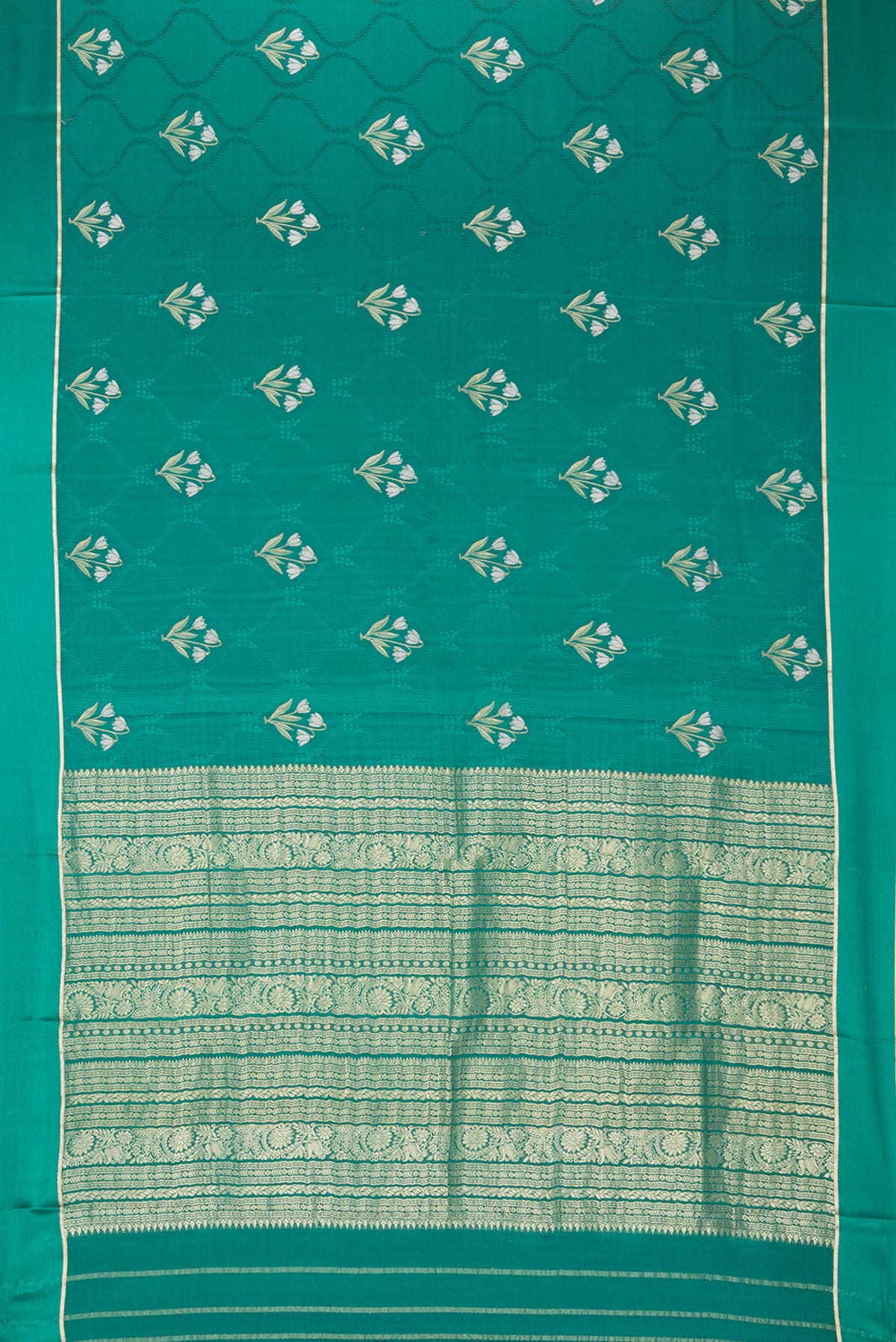 Flat view of Green Mysore Crepe Saree with Jacquard With Zari Butta on the body and Zari Border. 