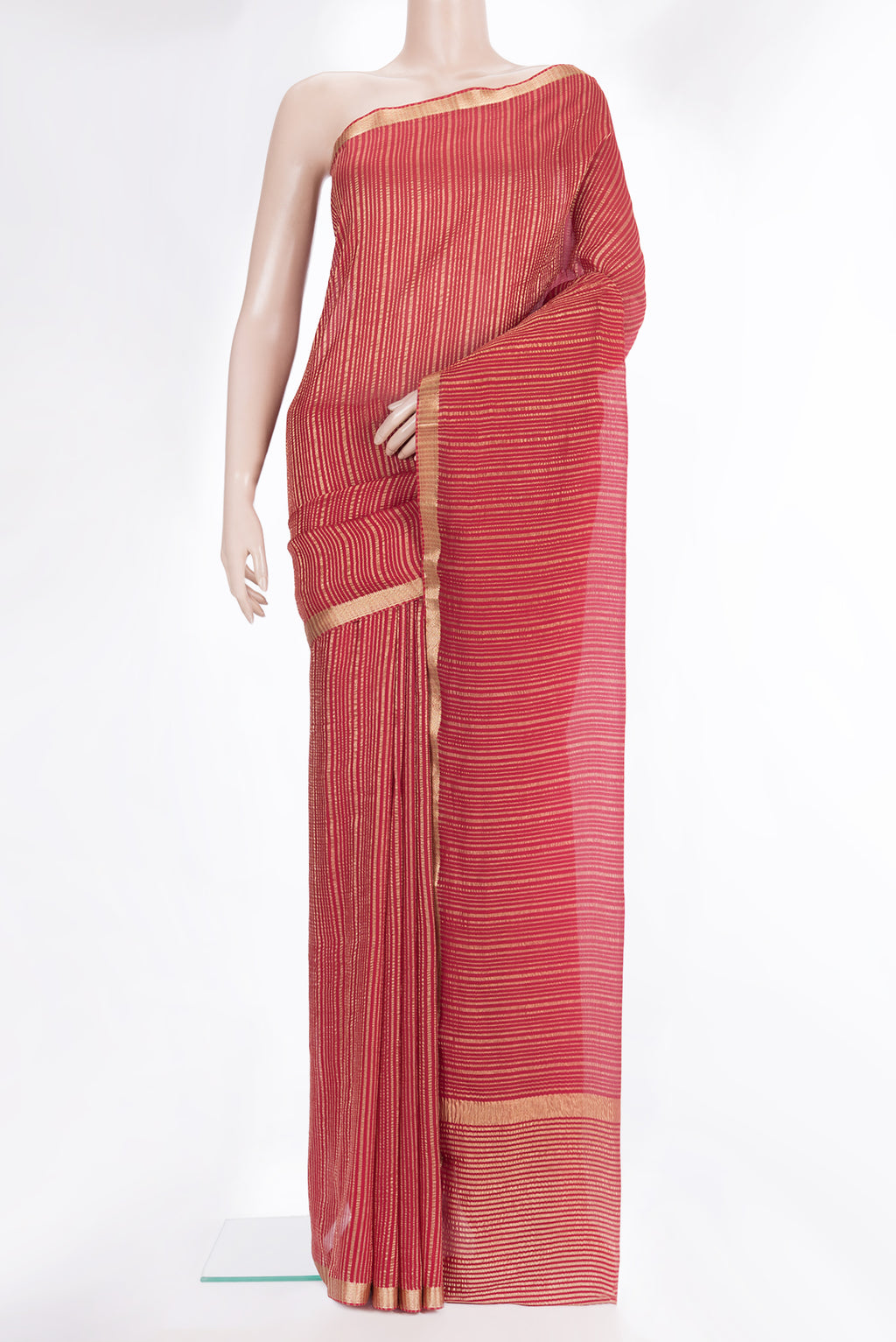Red Mysore Crepe Saree with Stripes on the body and Zari Border.  displayed on a mannequin