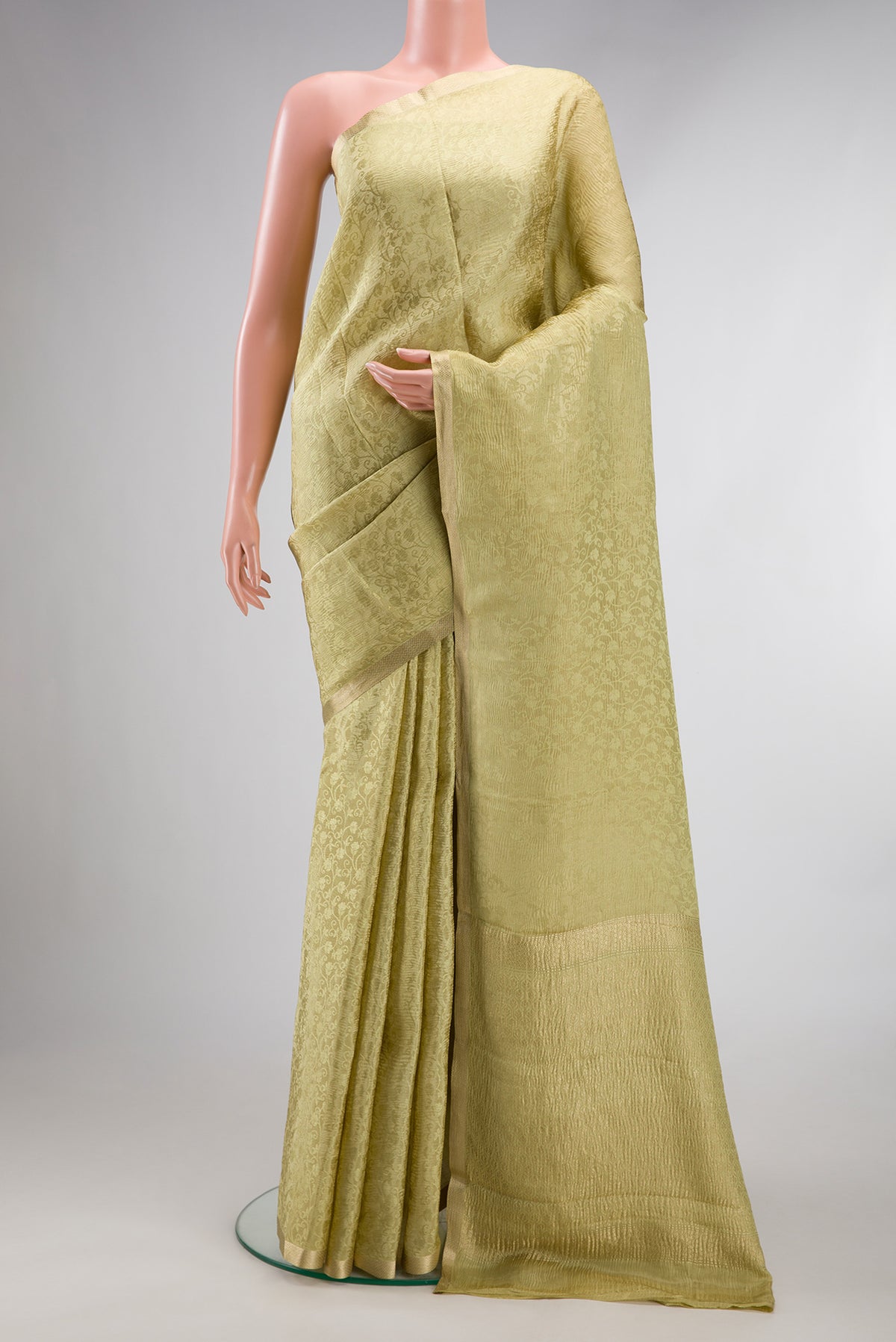 Sandal Mysore Chiffon Saree with Zari Brocade on the body and Zari Border.  displayed on a mannequin