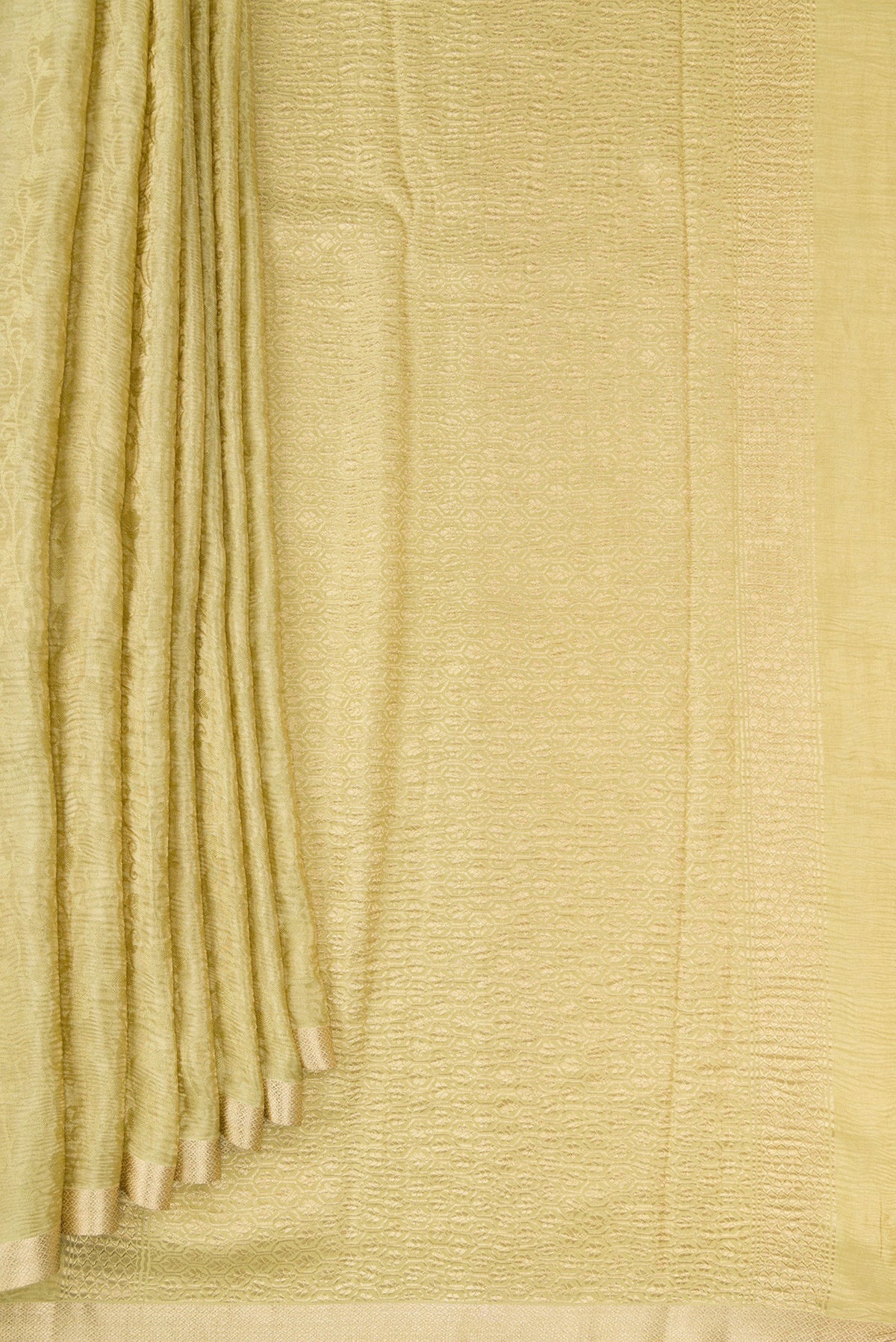 Pleats and pallu of Sandal Mysore Chiffon Saree with Zari Brocade on the body and Zari Border. 