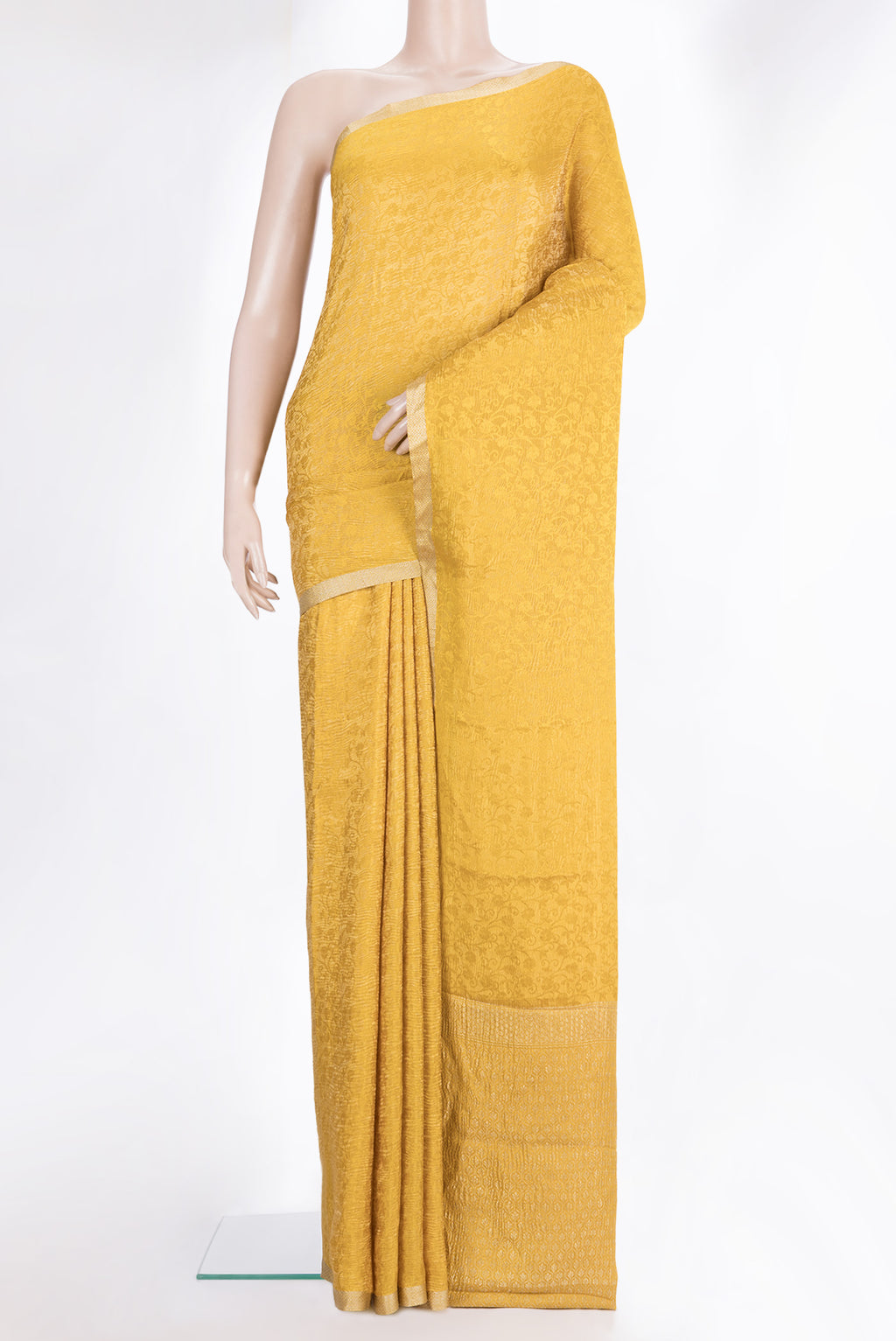 Mustard Dual Tone Banarasi Georgette Saree with Zari Brocade on the body and Zari Border.  displayed on a mannequin