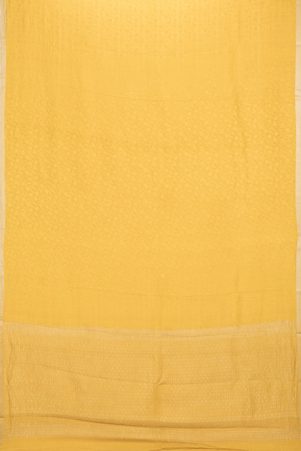 Flat view of Mustard Dual Tone Banarasi Georgette Saree with Zari Brocade on the body and Zari Border. 