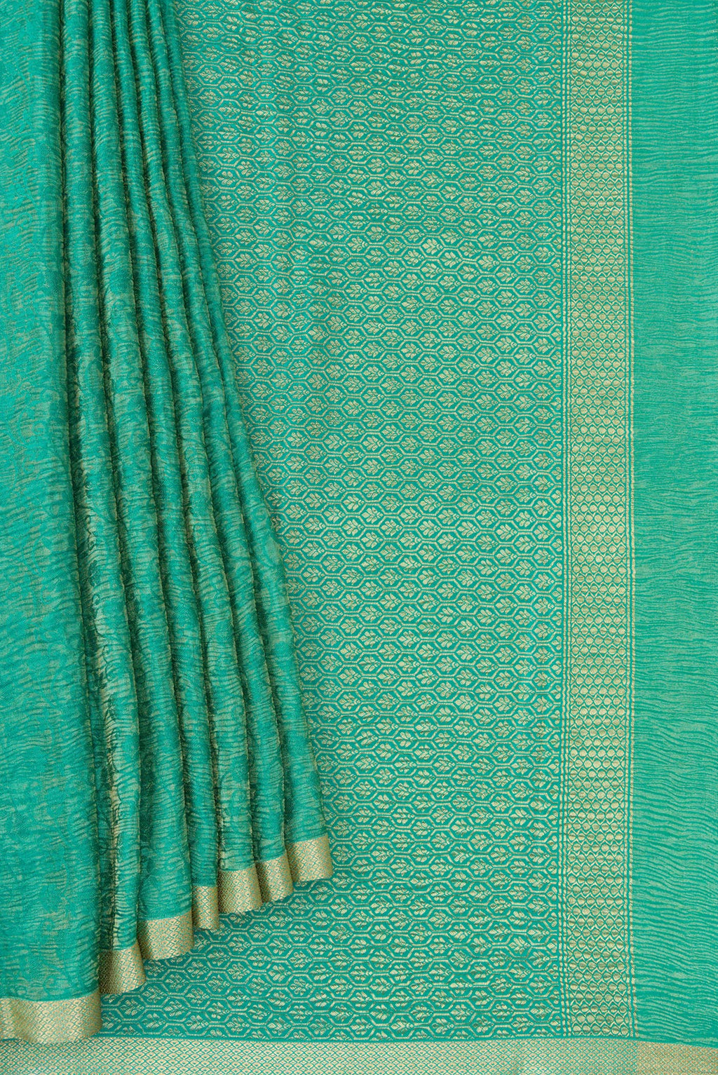 Pleats and pallu of Sea Green Mysore Crepe Saree with Zari Brocade on the body and Zari Border. 