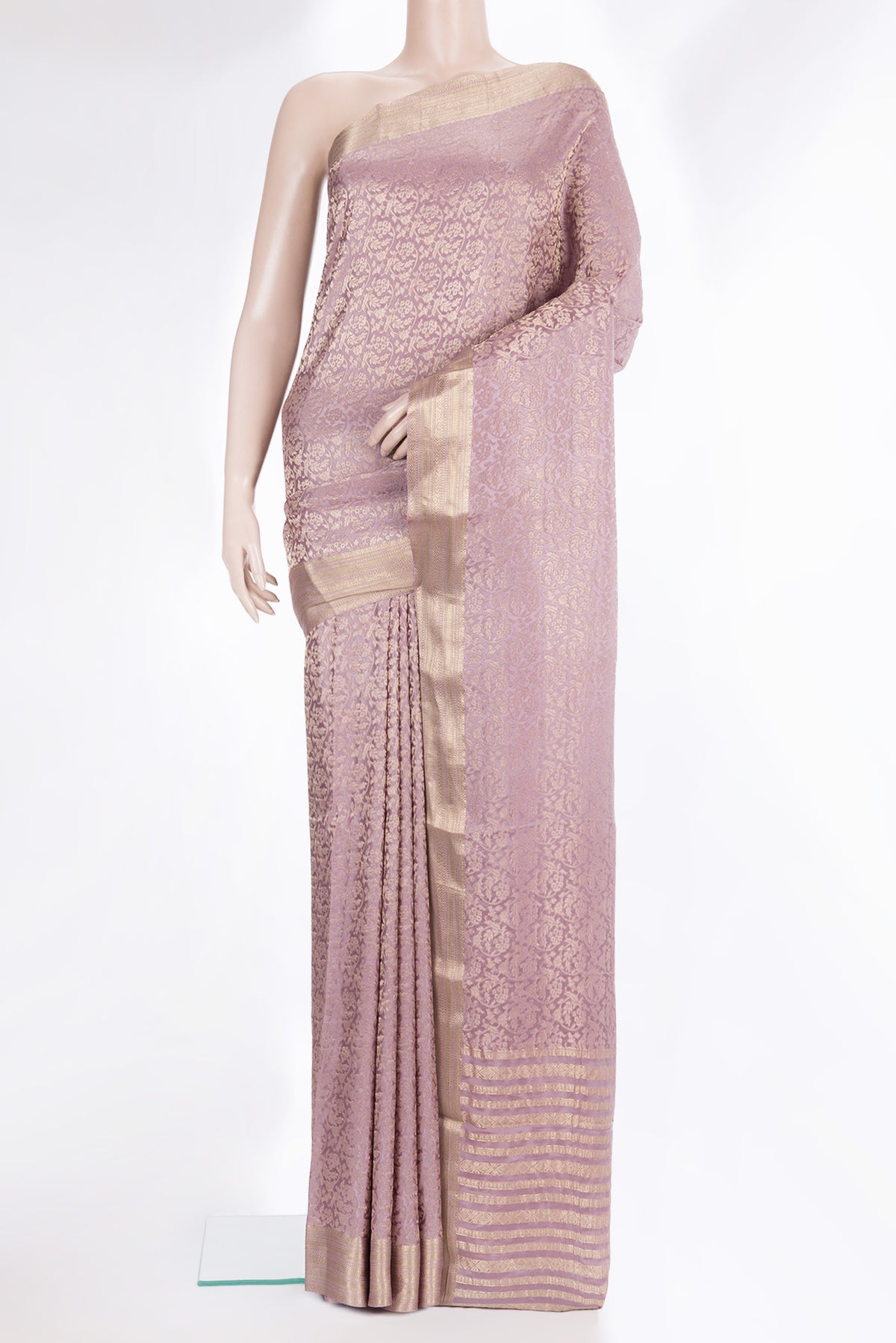 Lavender Dual Tone Banarasi Georgette Saree with Zari Brocade on the body and Zari Border.  displayed on a mannequin
