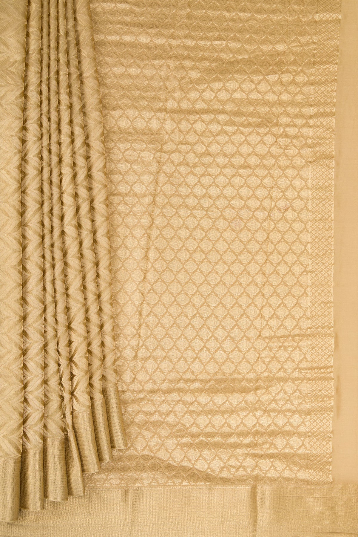 Pleats and pallu of Dark Beige Mysore Crepe Saree with Zari Brocade on the body and Zari Border. 