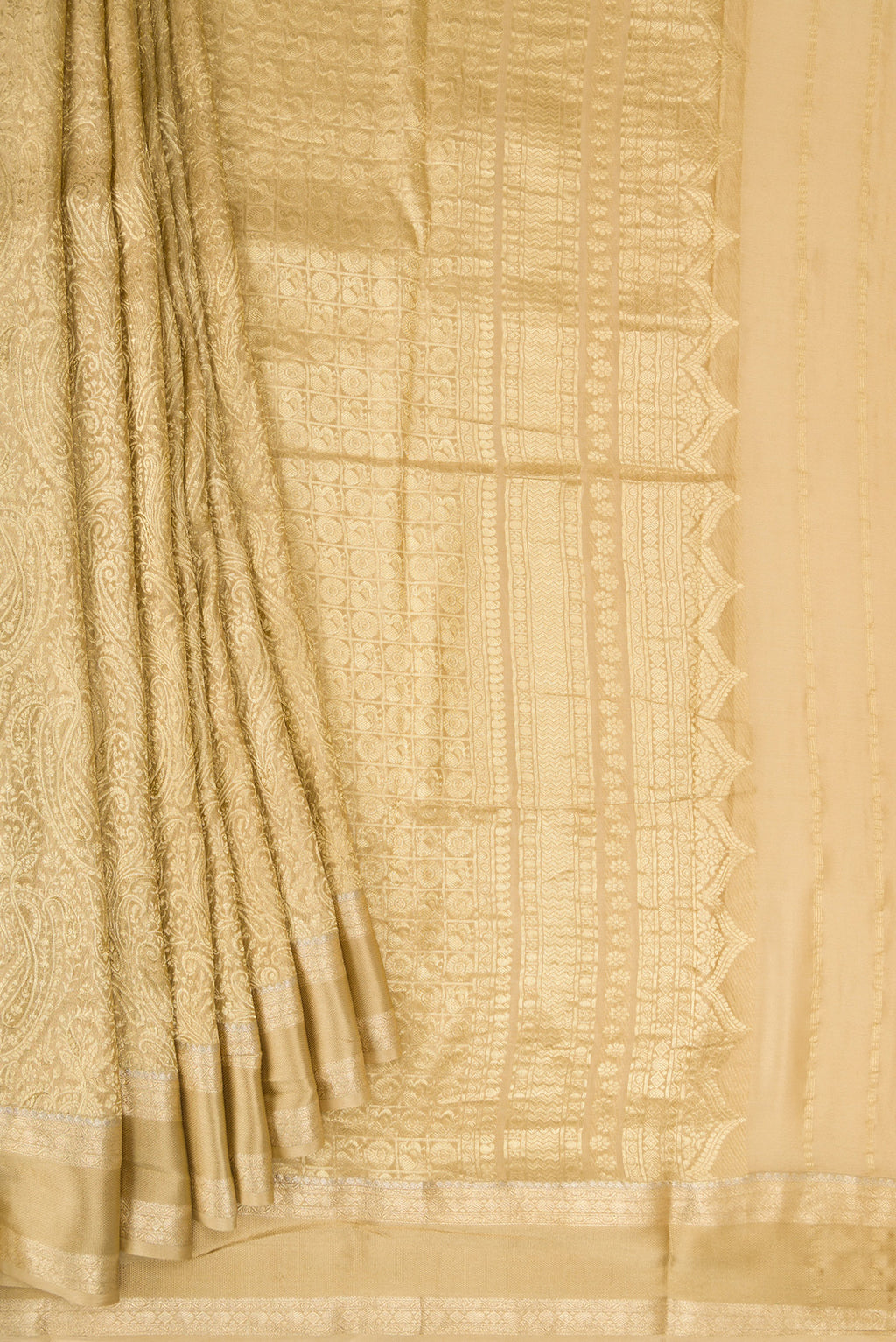 Pleats and pallu of Beige Mysore Crepe Saree with Zari Brocade on the body and Zari Border. 