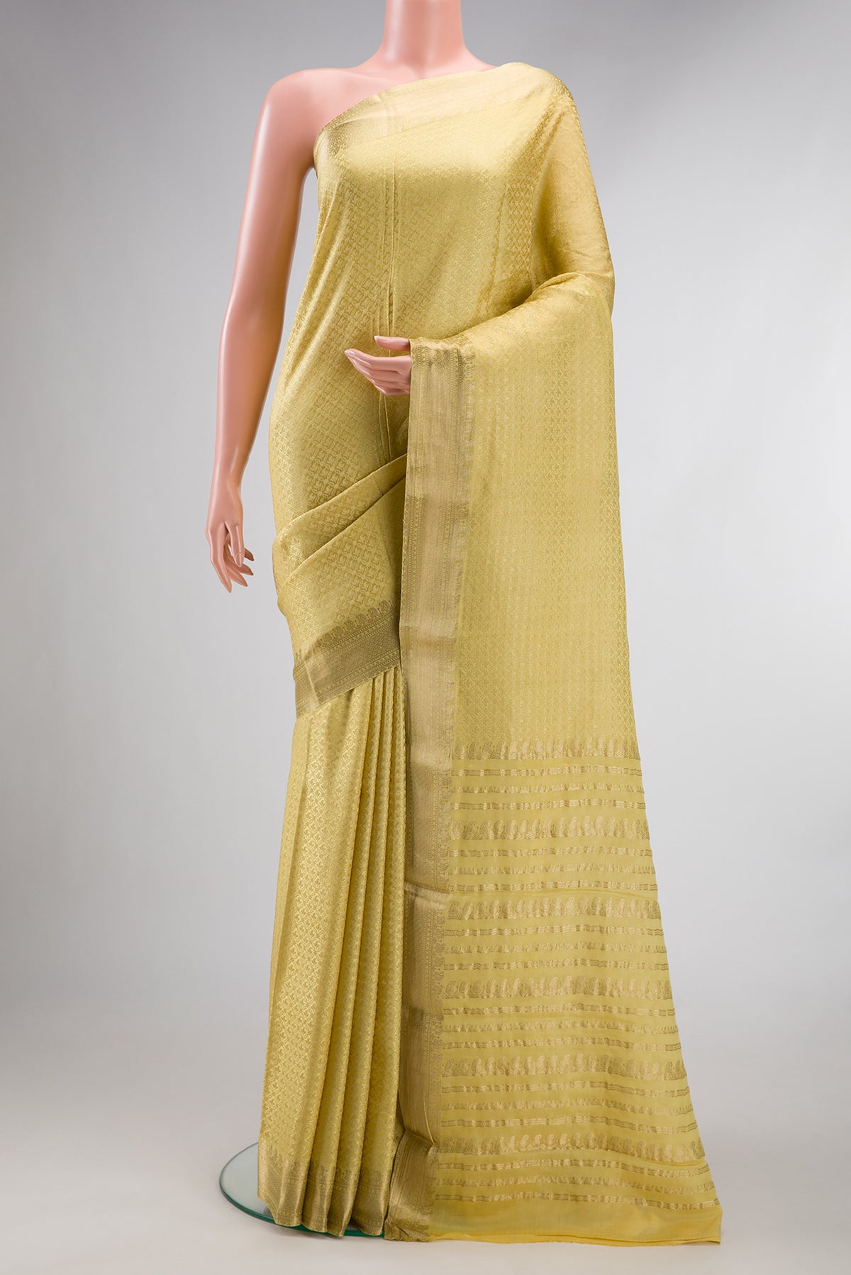 Sandal Mysore Chiffon Saree with Zari Brocade on the body and Zari Border.  displayed on a mannequin