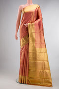 Pure Silk Pure Zari Pink Dual Tone Kanjivaram Tissue Saree with Zari Brocade on the body and Zari Border.  displayed on a mannequin